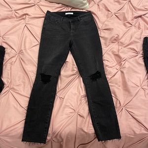 Pacsun high rise jeggings. Ripped knees and fringe on slim bottom